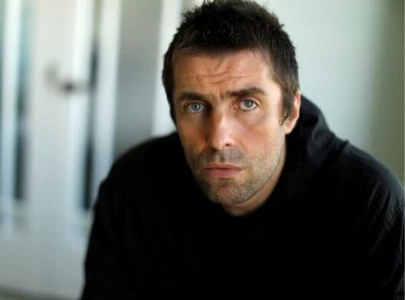 liam gallagher issues apology after backlash over racist tweet