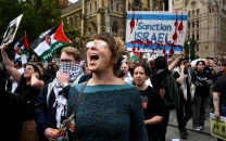 thousands rally across australia against israeli president s visit