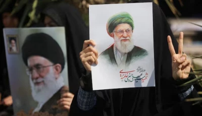 a woman holds an image of iran s late supreme leader ayatollah ali khamenei on the day of an anti israeli and us rally in tehran iran on march 6 2026 photo reuters