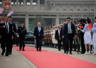 us president donald trump reacts as he walks towards air force one at beijing capital international airport in beijing china may 15 2026 photo reuters