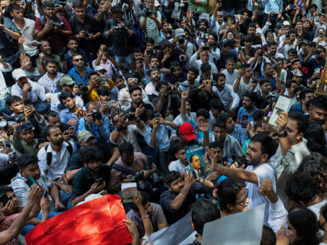 Abhijeet Dipke, head of the Cockroach Janta Party (CJP), speaks to supporters of the CJP during a sit-in protest demanding the resignation of Indian Education Minister Dharmendra Pradhan, in New Delhi, India, June 6, 2026. PHOTO: REUTERS