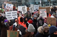 people shout slogans as they gather at a makeshift memorial at the site where a man identified as alex pretti was fatally shot by federal immigration agents trying to detain him in minneapolis minnesota us photo reuters