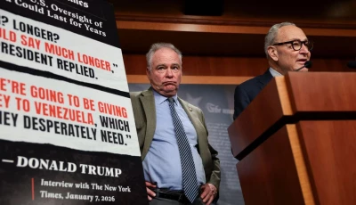 us senator tim kaine d va looks on while us senate minority leader chuck schumer d ny speaks during a press conference about venezuela on capitol hill in washington dc us january 8 2026 photo reuters