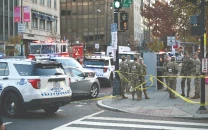 afghan charged for guard shooting in washington