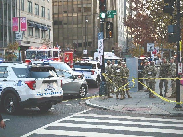 national guard soldiers gather near a crime scene after a shooting in downtown washington dc photo afp national guard soldiers gather near a crime scene after a shooting in downtown washington dc photo afp