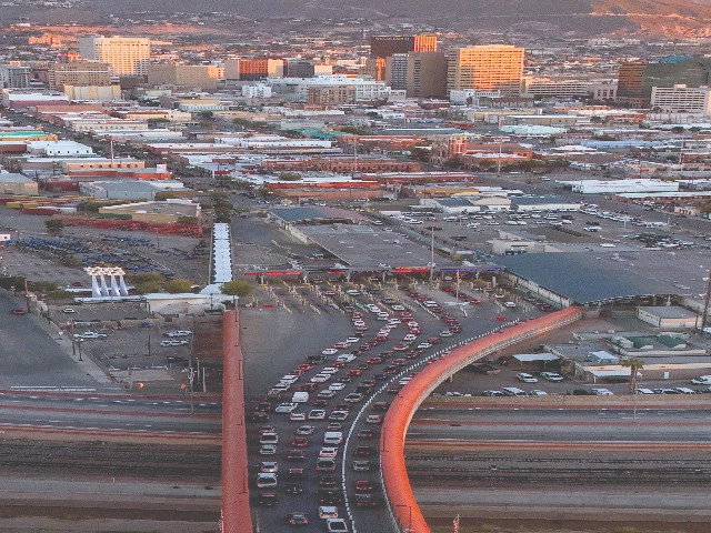 vehicles waiting in line to cross into the us via the paso del norte international bridge on the first day of a partial us government shutdown as seen from ciudad juarez mexico photo reuters