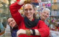 at the bustling market consul general conrad tribble and diplomats heather and anna maria enthusiastically joined fellow shoppers in selecting colourful earrings sparkly bangles and beautiful shoes for themselves and their loved ones screengrab