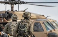 an image shows us troops with a chopper in the background photo anadolu