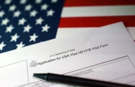 a us flag and a us h 1b visa application form are seen in this illustration taken september 22 2025 reuters