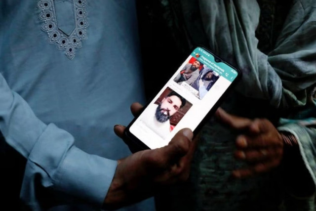a family member shows a mobile phone with a picture of muhammad nadeem 38 father of three sons who along with others died when a migrant boat shipwrecked off the coast near benghazi in libya outside his family home in hariyawala town in gujrat district of punjab province pakistan march 3 2023 reuters akhtar soomro a family member shows a mobile phone with a picture of muhammad nadeem 38 father of three sons who along with others died when a migrant boat shipwrecked off the coast near benghazi in libya outside his family home in hariyawala town in gujrat district of punjab province pakistan march 3 2023 reuters akhtar soomro