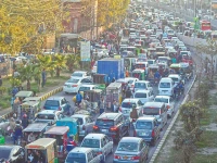 a large numbe of vehicles are struck in traffic jam on ravi road near greater iqbal park on the third day of basant celebration in the city photo app