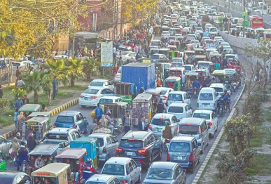 a large numbe of vehicles are struck in traffic jam on ravi road near greater iqbal park on the third day of basant celebration in the city photo app