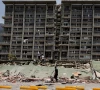 people inspect the rubble of a collapsed building after earthquakes hit the country in la guaira venezuela june 25 2026 photo reuters