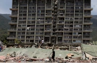 people inspect the rubble of a collapsed building after earthquakes hit the country in la guaira venezuela june 25 2026 photo reuters