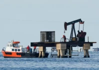 workers of venezuelan state oil company pdvsa labour at an operating pumpjack in lake maracaibo in cabimas venezuela january 27 2026 photo reuters
