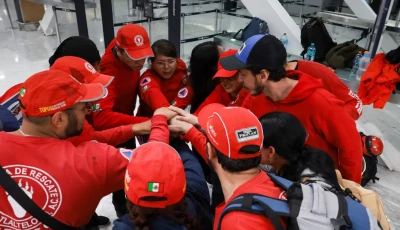 members of the mexican rescue team known as the topos tlatelolco rescue brigade huddle as they prepare to depart for venezuela following two earthquakes at benito juarez international airport in mexico city mexico june 26 2026 reuters