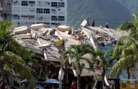 a damaged building is seen from the base camp of the french civil security training and intervention regiment uiisc 7 at the karting la guaira complex in caraballeda la guaira state venezuela on june 27 2026 as they assist with rescue operations following earthquakes reuters