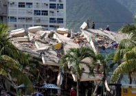 a damaged building is seen from the base camp of the french civil security training and intervention regiment uiisc 7 at the karting la guaira complex in caraballeda la guaira state venezuela on june 27 2026 as they assist with rescue operations following earthquakes reuters