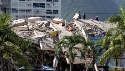 a damaged building is seen from the base camp of the french civil security training and intervention regiment uiisc 7 at the karting la guaira complex in caraballeda la guaira state venezuela on june 27 2026 as they assist with rescue operations following earthquakes reuters