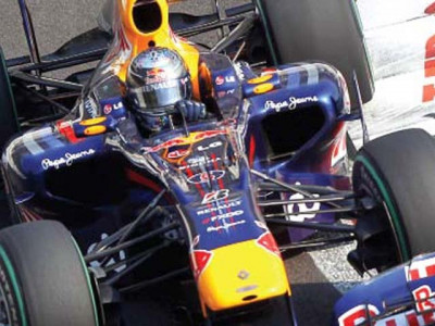 vettel storms to abu dhabi pole