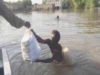 a flood hit man in kabirwala collects relief supplies photo express a flood hit man in kabirwala collects relief supplies photo express