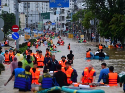 vietnam flooding kills at least 90