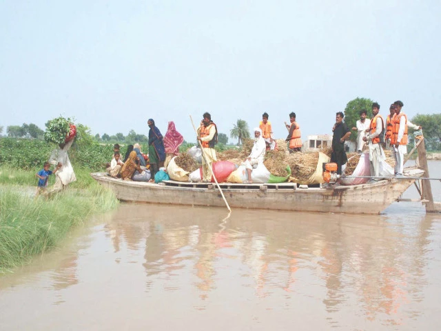 rescue 1122 officials assist residents onto boats to evacuate them from flood hit villages after a breach in the sutlej river submerged hundreds of acres of farmland in bahawalpur disrupting livelihoods and forcing families to flee their homes photo app rescue 1122 officials assist residents onto boats to evacuate them from flood hit villages after a breach in the sutlej river submerged hundreds of acres of farmland in bahawalpur disrupting livelihoods and forcing families to flee their homes photo app