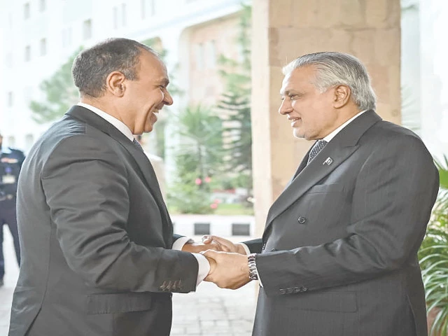 foreign minister ishaq dar greets his egyptian counterpart badr abdelatty upon arrival at the foreign ministry in islamabad photo afp