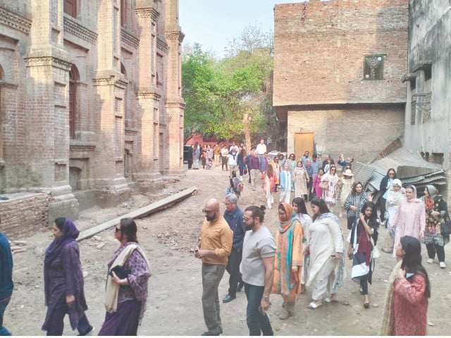 tourists visit conservation project sites during a heritage tour organised by the walled city of lahore authority photo nni