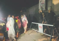 security personnel cordon off a street as local residents evacuate their homes near thesecurity personnel cordon off a street as local residents evacuate their homes near the site of an indian strike in muzaffarabad ajk photo afp ajk photo afp