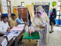 a woman votes during the second phase of the azad jammu and kashmir ajk legislative assembly elections at a polling station in muzaffarabad on august 2 2026 picture taken with a mobile phone photo reuters a woman votes during the second phase of the azad jammu and kashmir ajk legislative assembly elections at a polling station in muzaffarabad on august 2 2026 picture taken with a mobile phone photo reuters