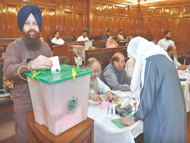 a member of the k p assembly casts his vote in peshawar for a reserved women s seat following the resignation of senator sania nishtar photo app a member of the k p assembly casts his vote in peshawar for a reserved women s seat following the resignation of senator sania nishtar photo app