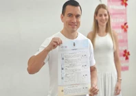 ecuador s president daniel noboa shows his ballot next to his wife lavinia valbonesi before casting his vote in the referendum in olon ecuador photo afp