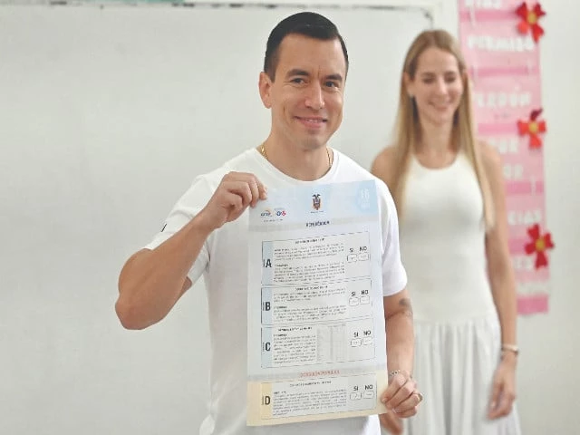 ecuador s president daniel noboa shows his ballot next to his wife lavinia valbonesi before casting his vote in the referendum in olon ecuador photo afp ecuador s president daniel noboa shows his ballot next to his wife lavinia valbonesi before casting his vote in the referendum in olon ecuador photo afp