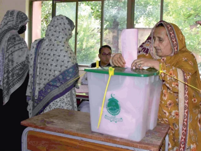 people s voice a woman casts her ballot at a polling station during the second phase of elections for the ajk legislative assembly in muzaffarabad photo afp people s voice a woman casts her ballot at a polling station during the second phase of elections for the ajk legislative assembly in muzaffarabad photo afp