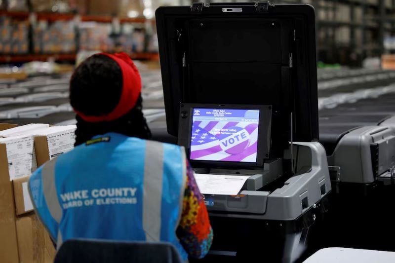 a precinct official performs logic and accuracy testing on voting machines ahead of the upcoming general election at wake county board of elections headquarters in raleigh north carolina us september 5 2024 photo reuters