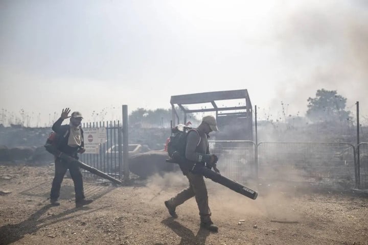 firefighters conduct extinguishing work after fire broke out in 15 places in northern israel due to missiles fired from lebanon and shrapnel falling during blocking operations at golan heights in israel on june 13 2024