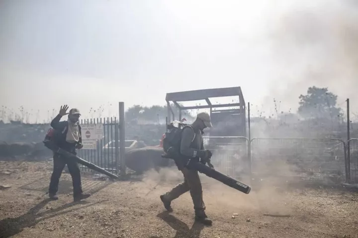 firefighters conduct extinguishing work after fire broke out in 15 places in northern israel due to missiles fired from lebanon and shrapnel falling during blocking operations at golan heights in israel on june 13 2024 firefighters conduct extinguishing work after fire broke out in 15 places in northern israel due to missiles fired from lebanon and shrapnel falling during blocking operations at golan heights in israel on june 13 2024