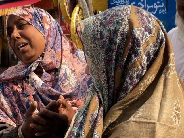 a woman in sentiments after receiving her relative from india via wagah attari border photo asif mehmood a woman in sentiments after receiving her relative from india via wagah attari border photo asif mehmood