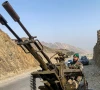 a taliban security personnel operating an anti aircraft gun keeps watch for pakistani airstrikes near the torkham border crossing between afghanistan and pakistan in the nangarhar province on february 27 2026 photo afp