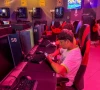 boys look at their mobile phones at a gaming centre after the united arab emirates approved a resolution setting the minimum age for social media use at 15 in dubai united arab emirates june 18 2026 photo reuters
