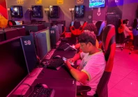 boys look at their mobile phones at a gaming centre after the united arab emirates approved a resolution setting the minimum age for social media use at 15 in dubai united arab emirates june 18 2026 photo reuters