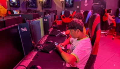 boys look at their mobile phones at a gaming centre after the united arab emirates approved a resolution setting the minimum age for social media use at 15 in dubai united arab emirates june 18 2026 photo reuters