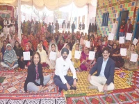 world bank group president ajay banga mrs banga and cm murad ali shah pose for a photograph with flood affected women displaying land titles for their newly reconstructed houses in bahwal jat village photo express