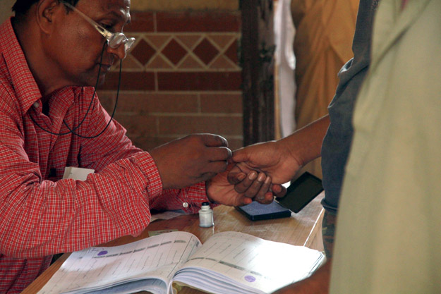 There were a lot of security and checks for prospective voters to go through before being allowed to cast their vote. PHOTO: ATHAR KHAN/EXPRESS