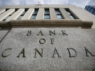 bank of canada cuts interest rate warns of us tariff impact