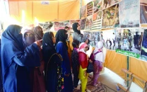 women gather at the ji camp on new ma jinnah road to condemn indian atrocities against kashmiris on solidarity day shocking images that expose the harsh realities of life under occupation are at presented the nation stands united in solidarity with the brave people of kashmir fighting for their rights and freedom photo jalal qureshi express