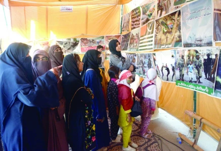 women gather at the ji camp on new ma jinnah road to condemn indian atrocities against kashmiris on solidarity day shocking images that expose the harsh realities of life under occupation are at presented the nation stands united in solidarity with the brave people of kashmir fighting for their rights and freedom photo jalal qureshi express
