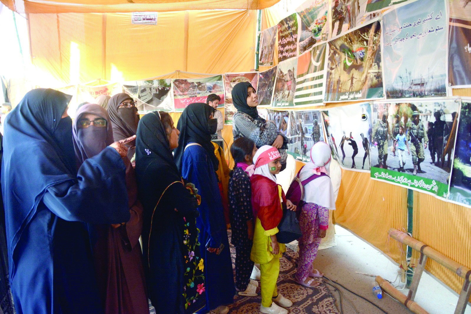 women gather at the ji camp on new ma jinnah road to condemn indian atrocities against kashmiris on solidarity day shocking images that expose the harsh realities of life under occupation are at presented the nation stands united in solidarity with the brave people of kashmir fighting for their rights and freedom photo jalal qureshi express