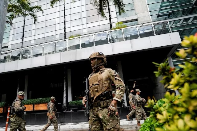 members of panama s national aeronaval service police senan stand outside the hotel where migrants from asia and the middle east are housed after being deported to panama as part of an agreement between the administration of us president donald trump and the central american nation in panama city panama on february 18 2025 photo reuters members of panama s national aeronaval service police senan stand outside the hotel where migrants from asia and the middle east are housed after being deported to panama as part of an agreement between the administration of us president donald trump and the central american nation in panama city panama on february 18 2025 photo reuters